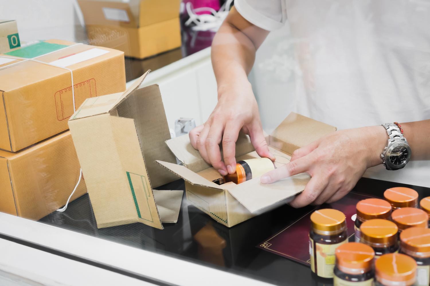 Packing medications into box