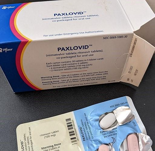 Paxlovid box and pills