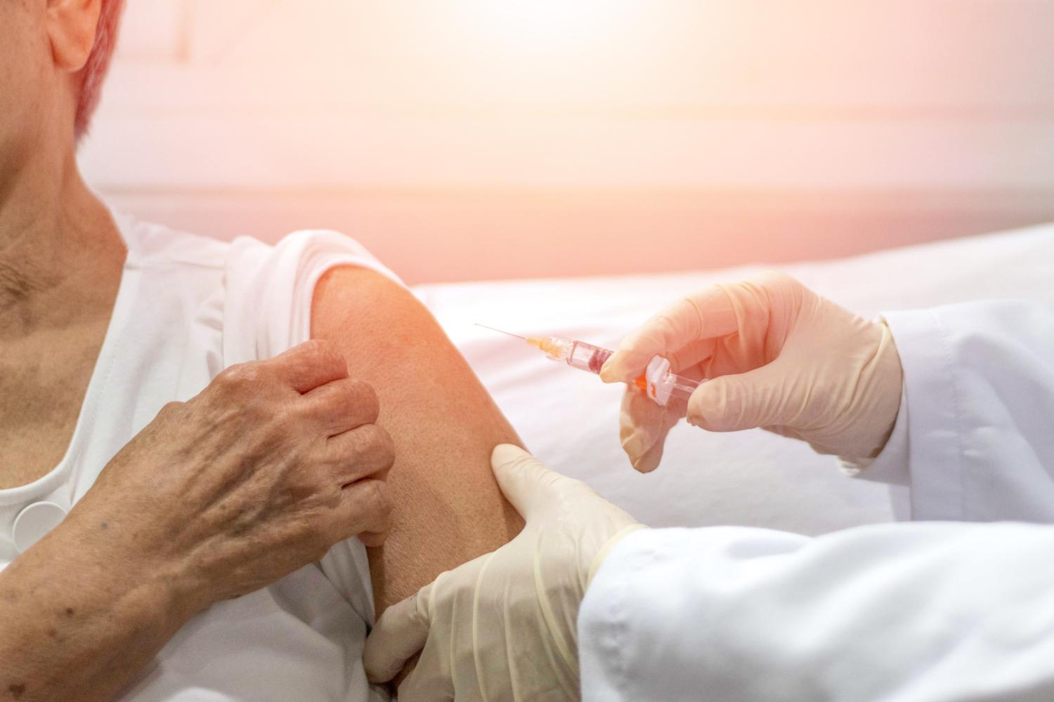 Older woman getting vaccinated