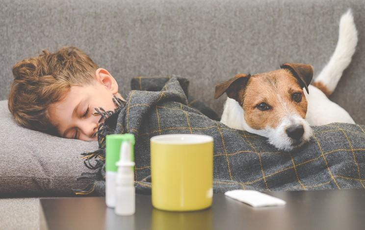 Sick boy with dog