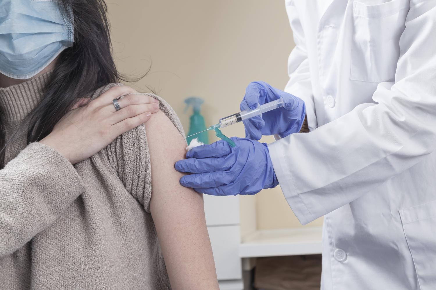 Woman being vaccinated
