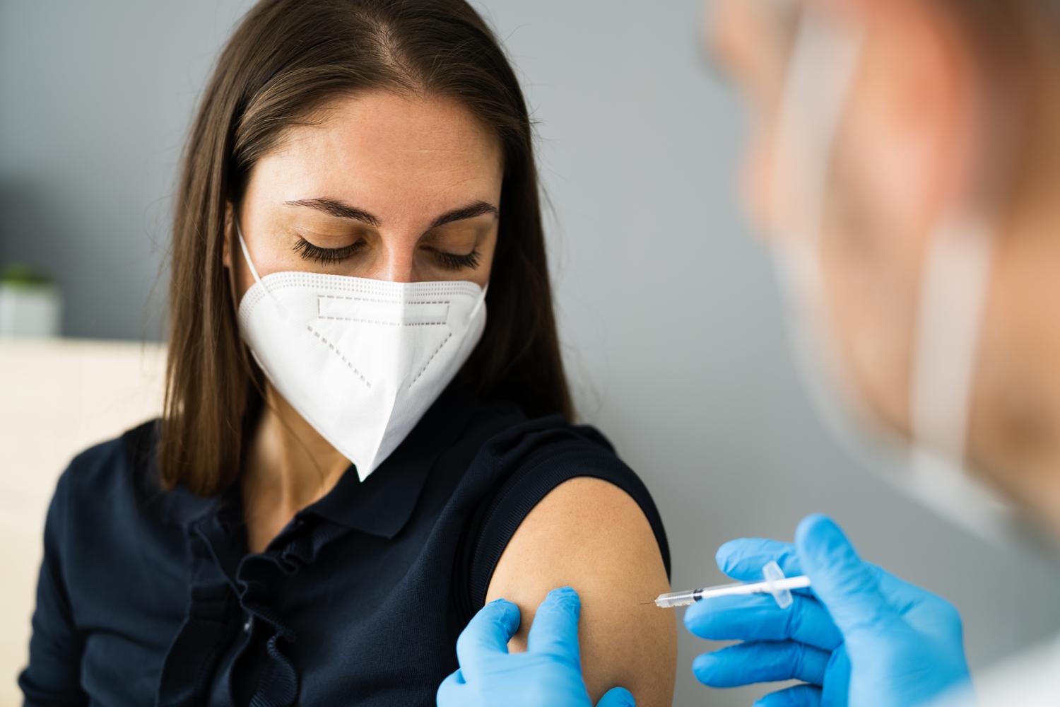 Woman getting vaccinated