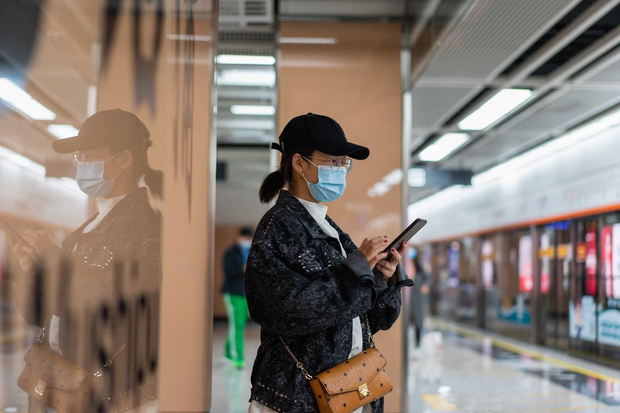 Subway woman in mask