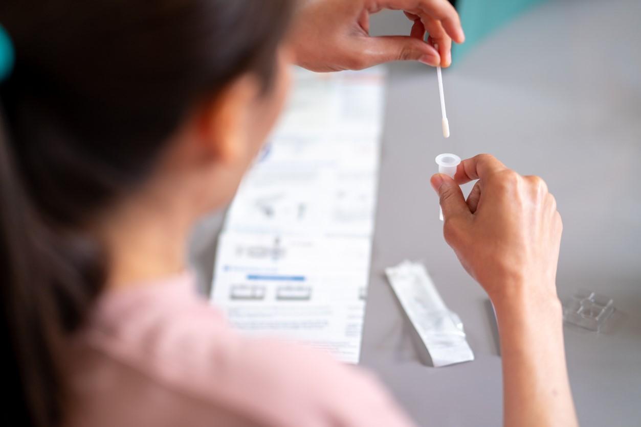 Woman taking rapid test