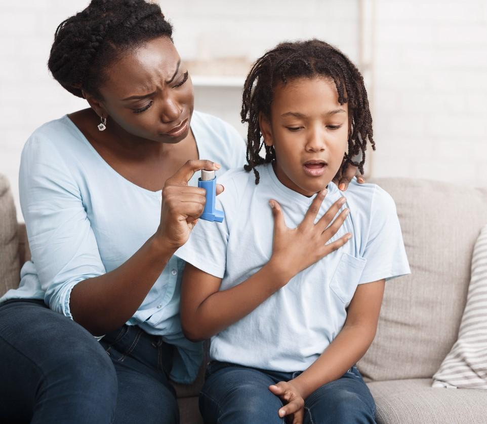 Girl with asthma with mom