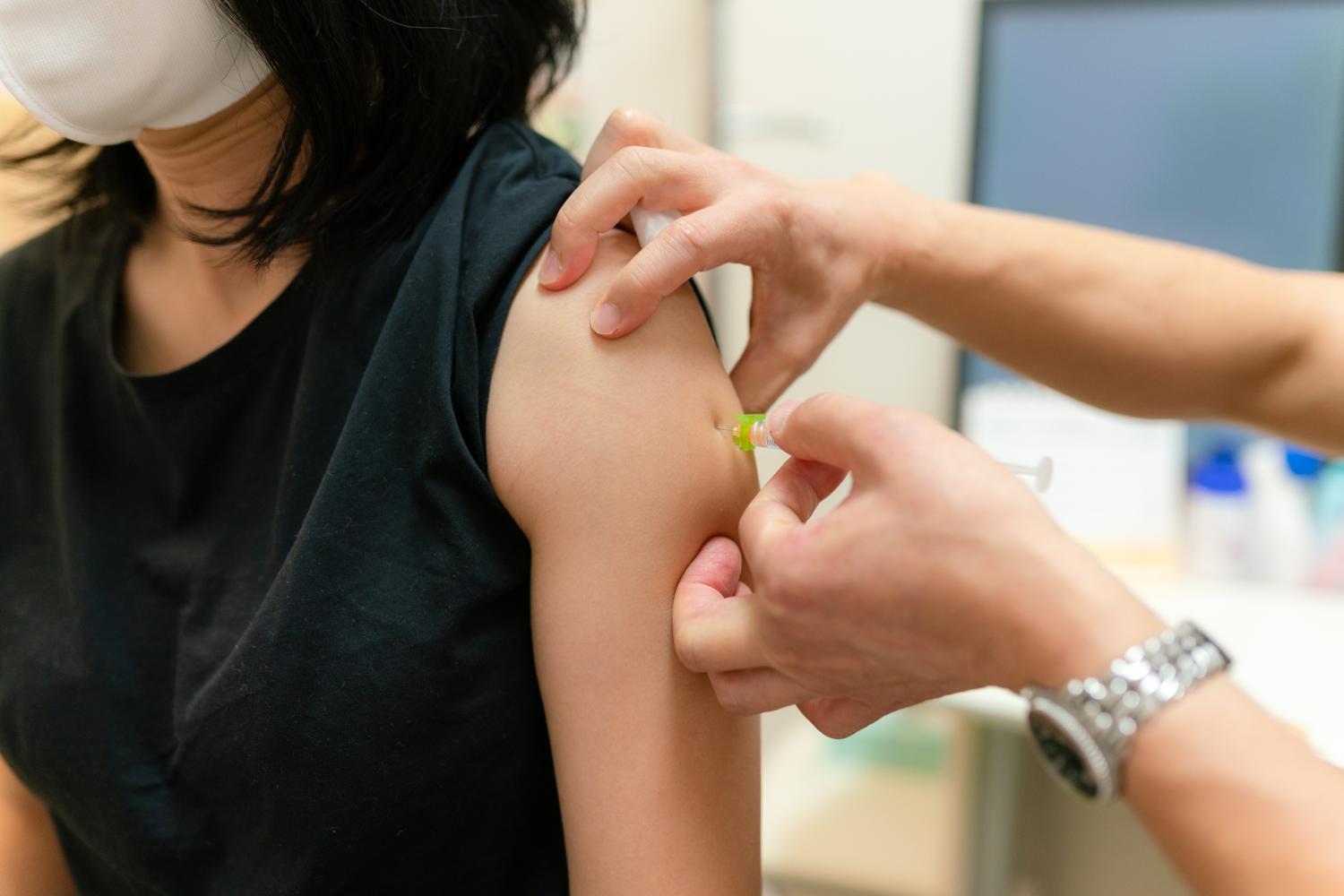 Woman getting booster shot