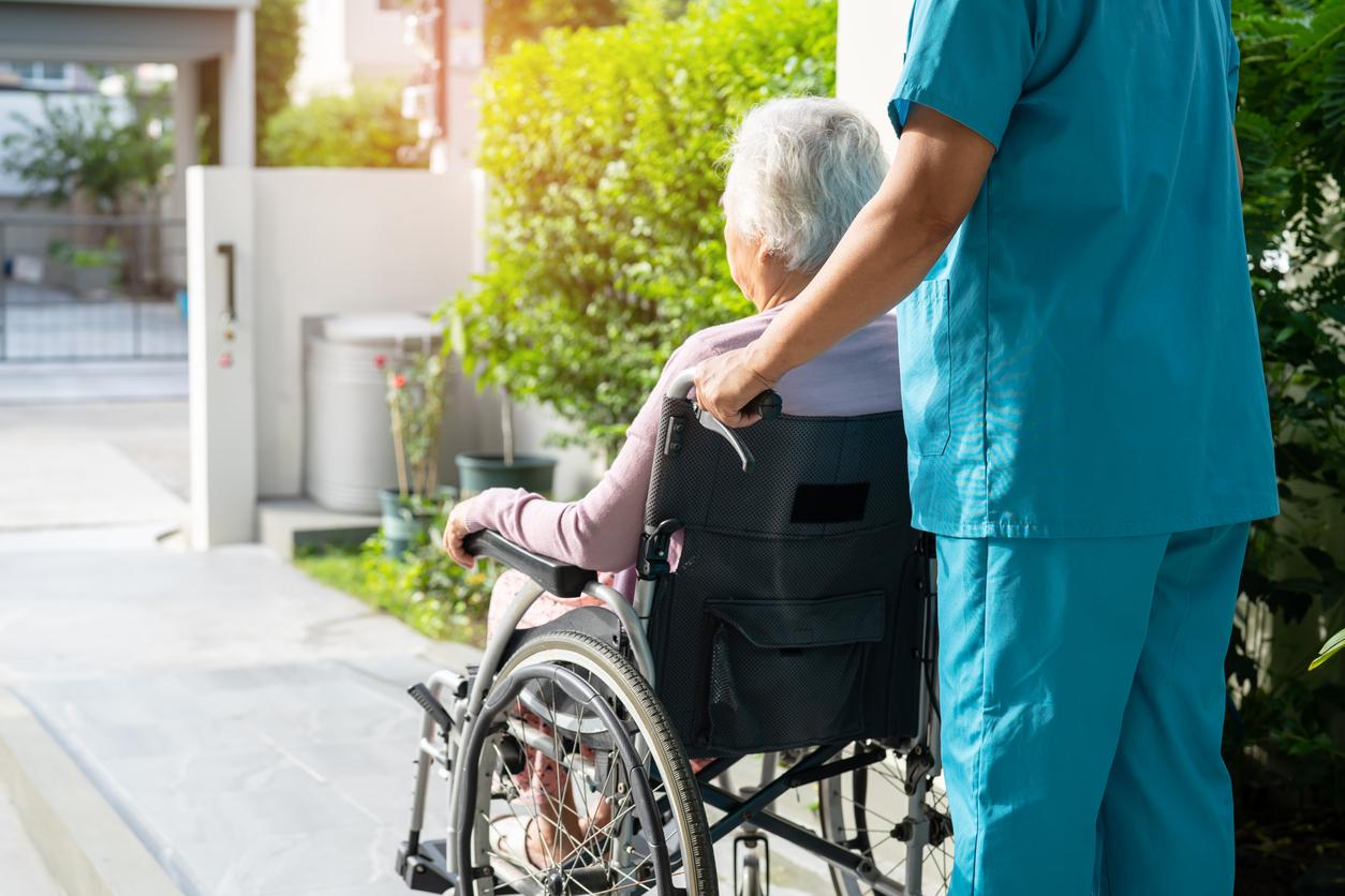 Elderly woman in wheelchair