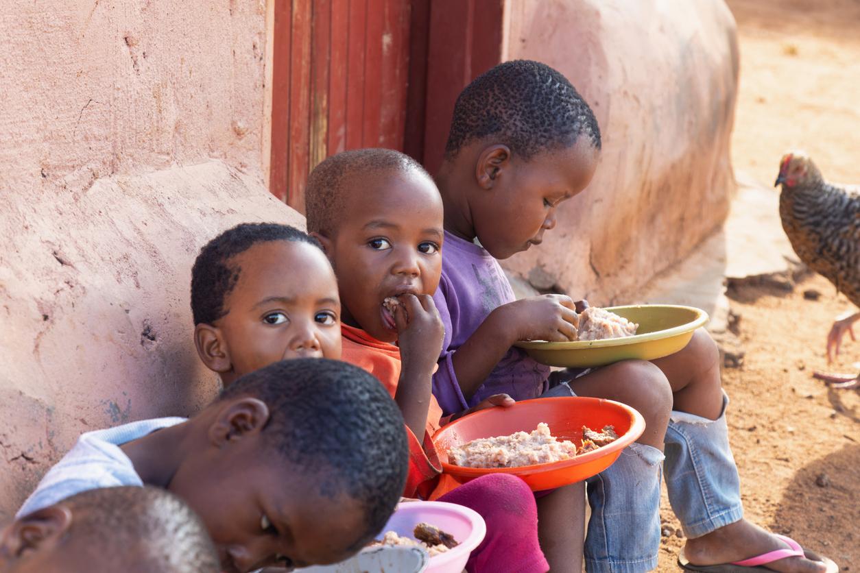 African children eating a meal