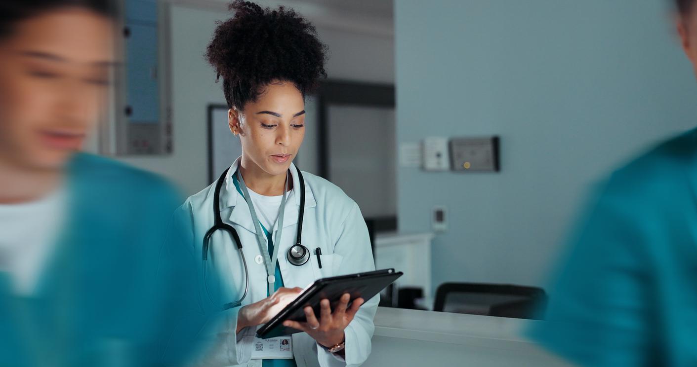 Doctor looking at tablet