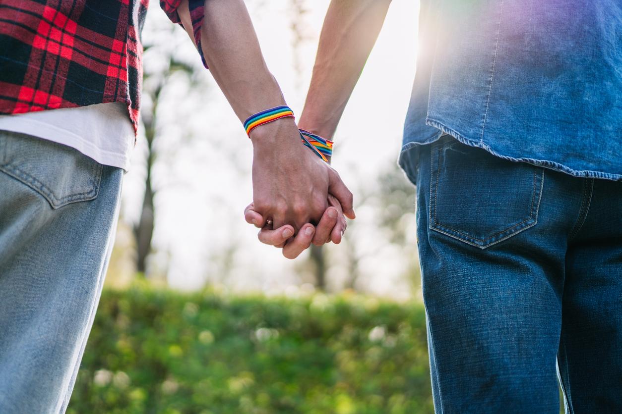 men holding hands