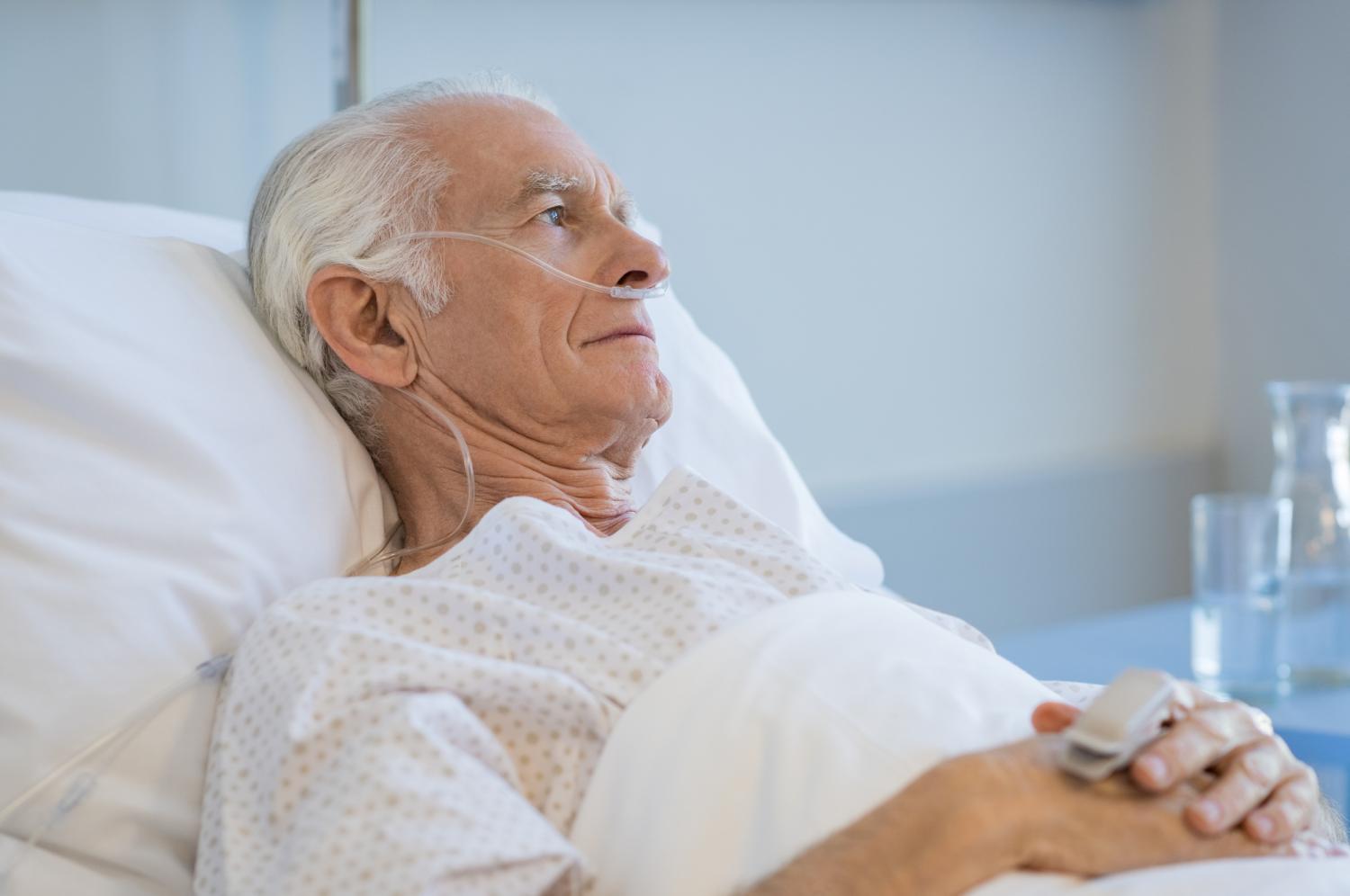 Older man in hospital bed