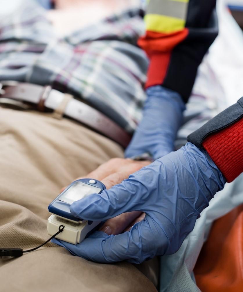 Paramedics with heart patient