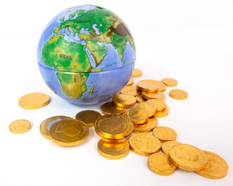 Globe showing Africa plus coins