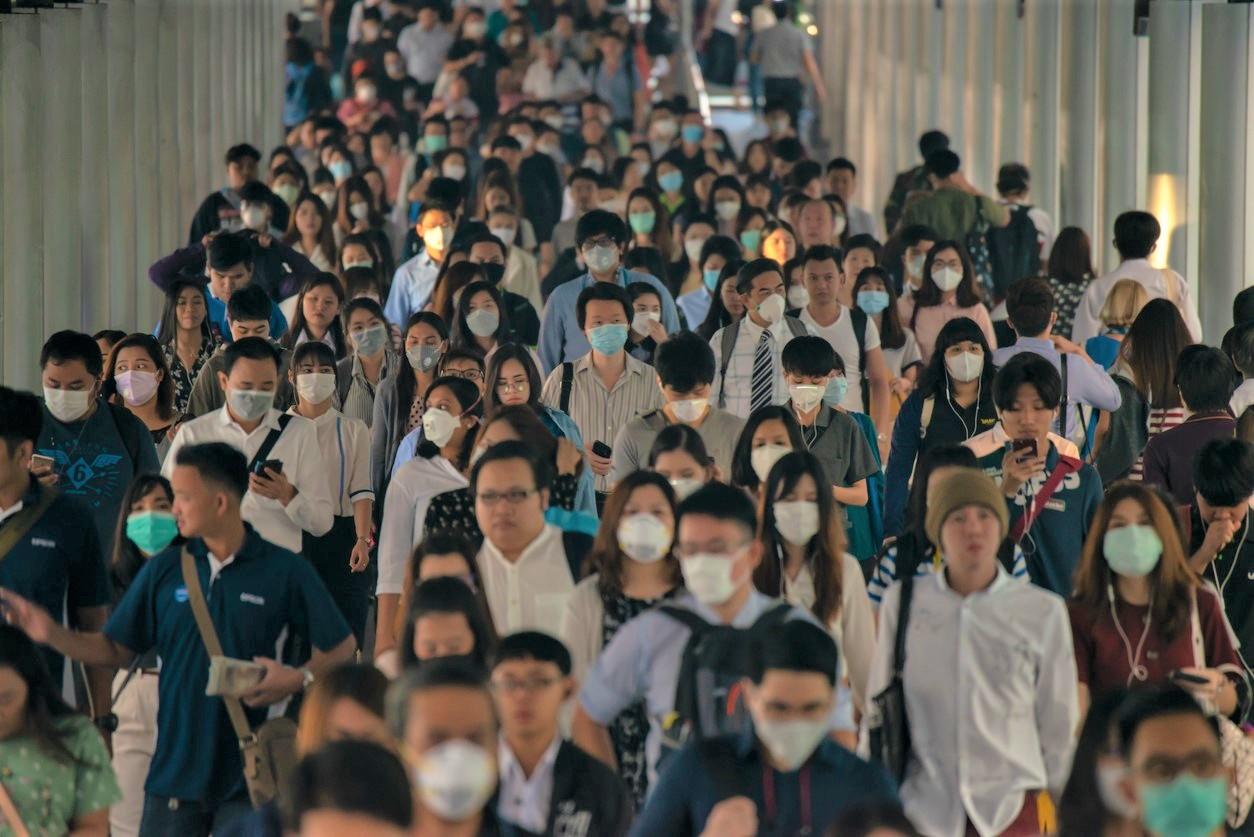 Asian crowd wearing masks