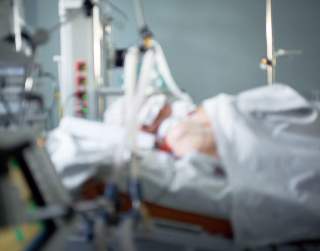 Patient in ICU bed