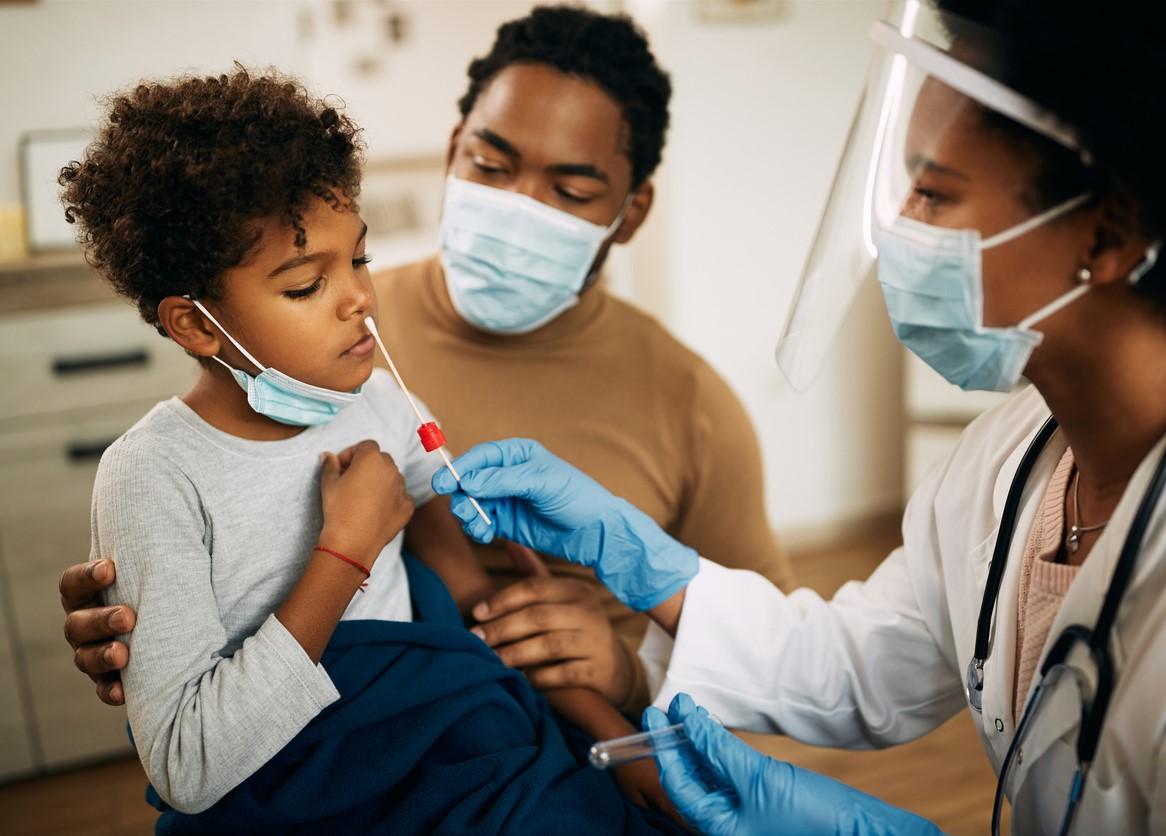 Boy getting PCR nasal swab