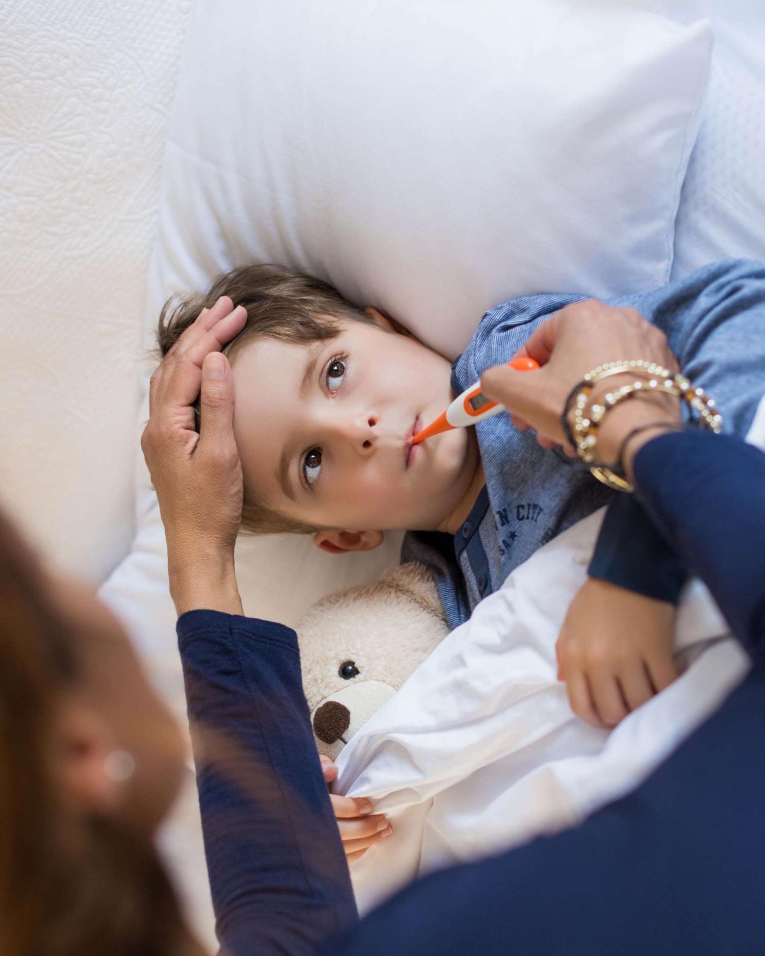 Boy with thermometer