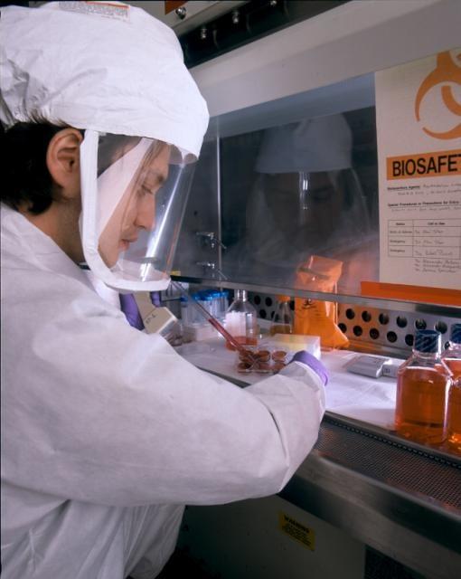 Scientist in a biosecurity level 3 lab