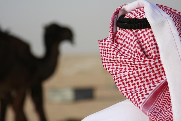 Camel and Saudi man