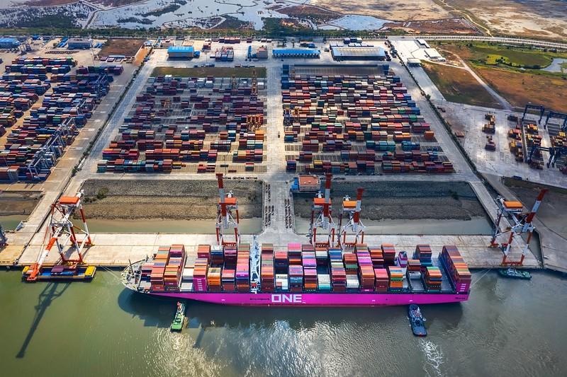 Cargo containers being loaded onto ship