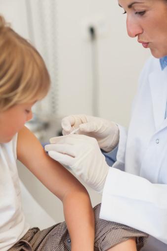 Child receiving vaccine