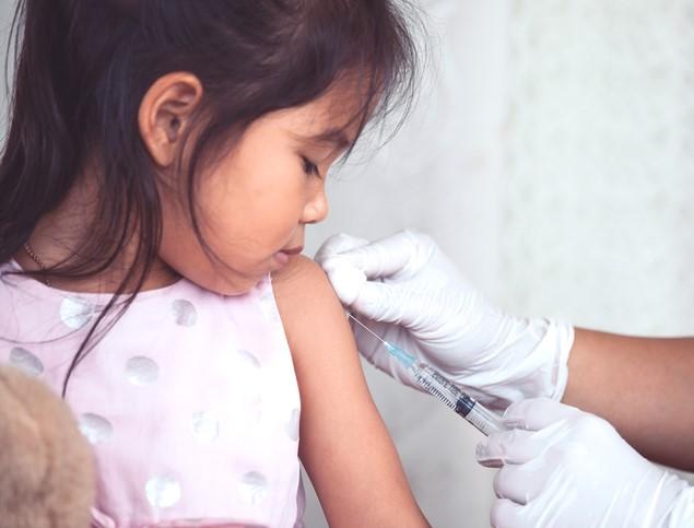 Child receiving flu shot