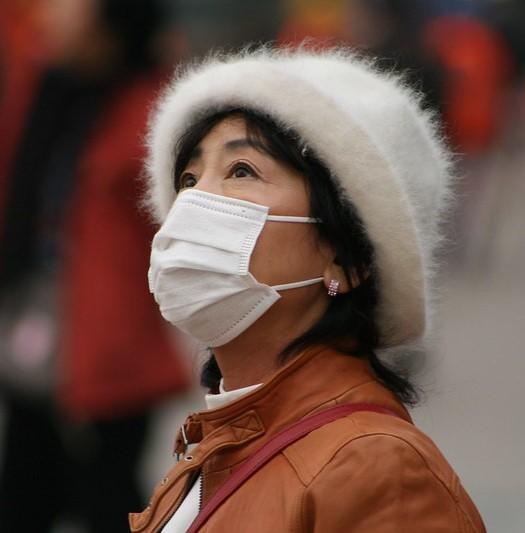 Chinese woman wearing mask