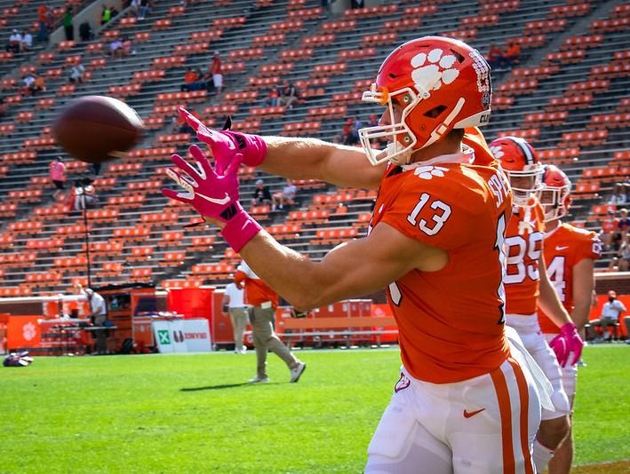 Clemson footbal players warming up