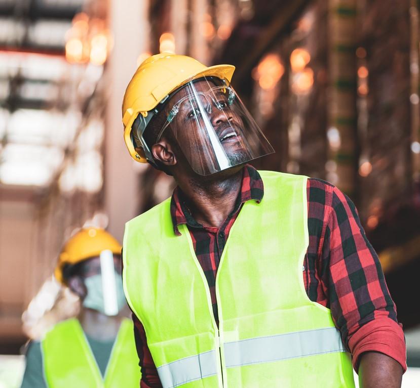 Construction workers in warehouse