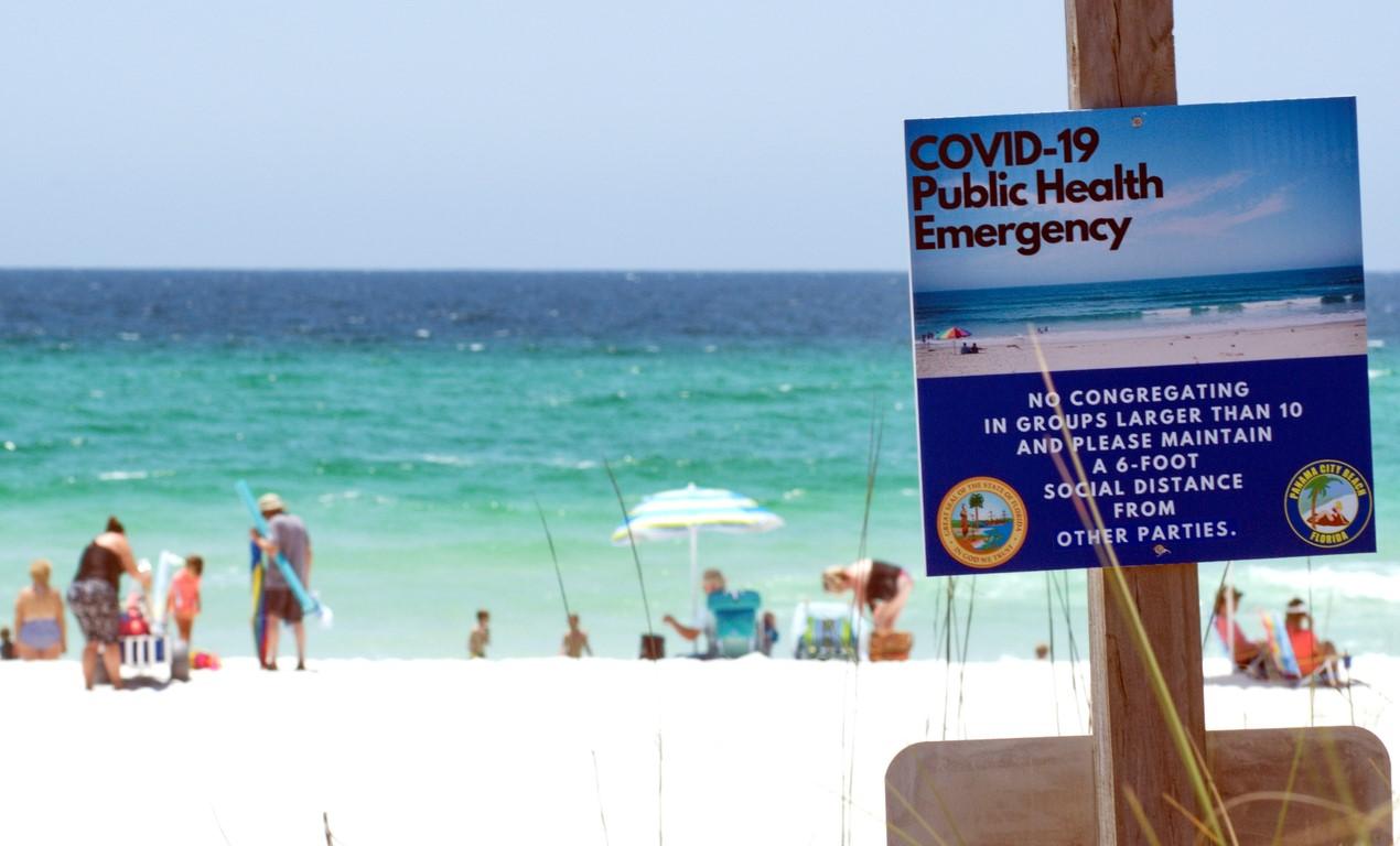 COVID-19 sign on Florida beach