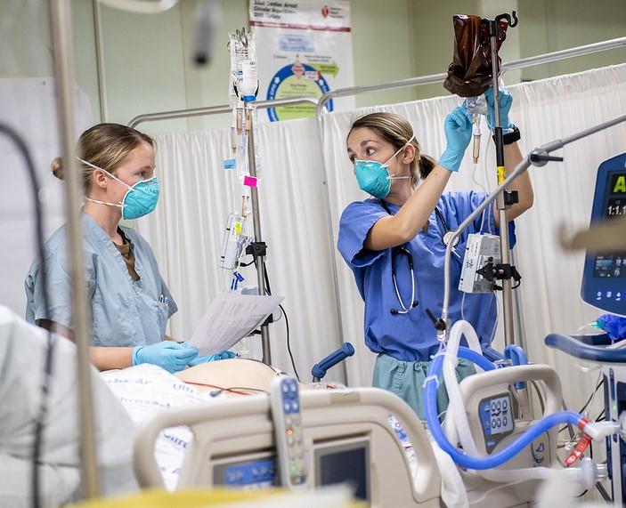 COVID-19 hospital team at bedside