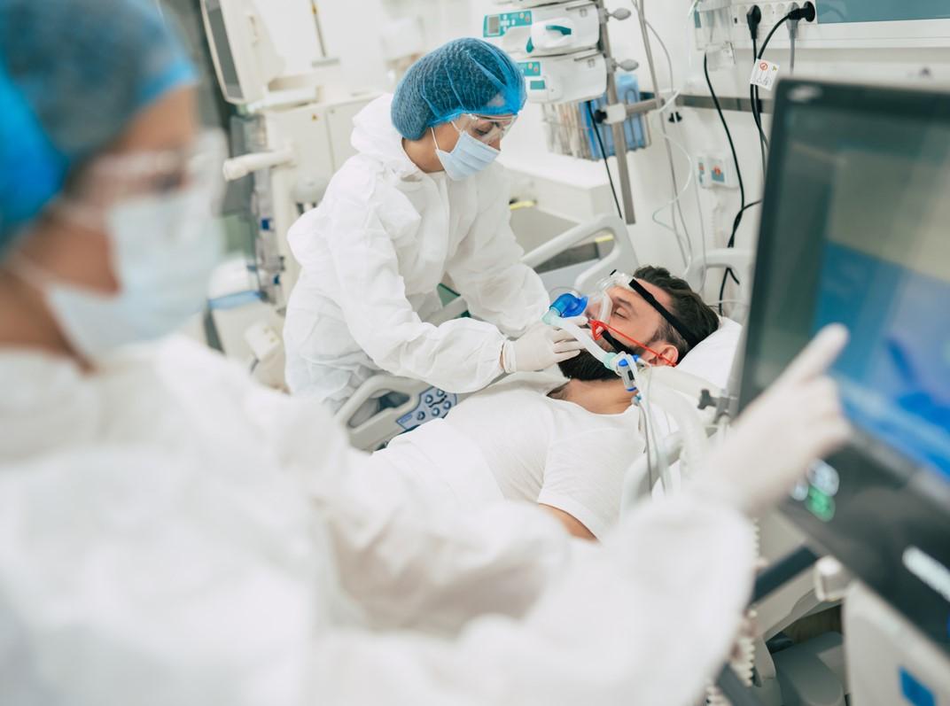 COVID patient in hospital room