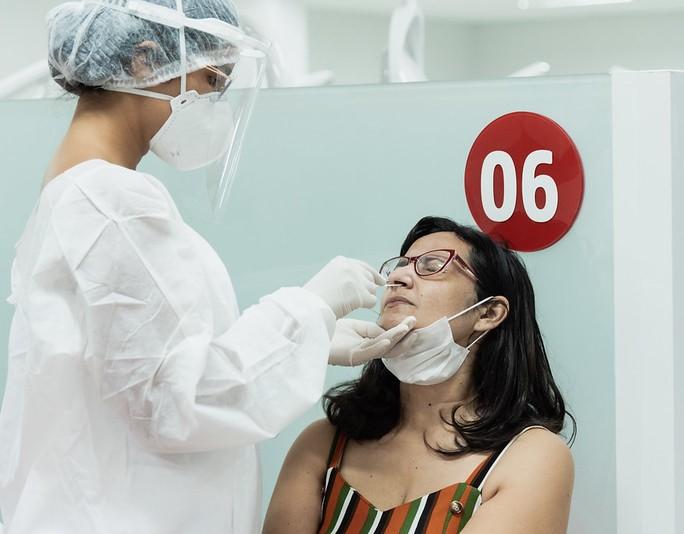 Woman getting COVID-19 swab test