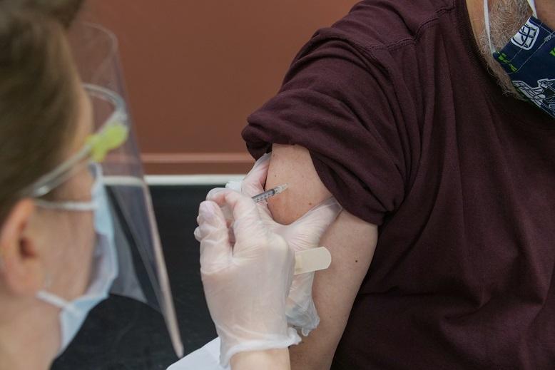 Man getting COVID vaccine