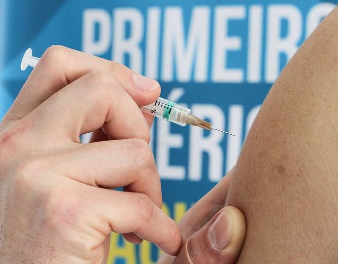 Dengue vaccine needle and arm