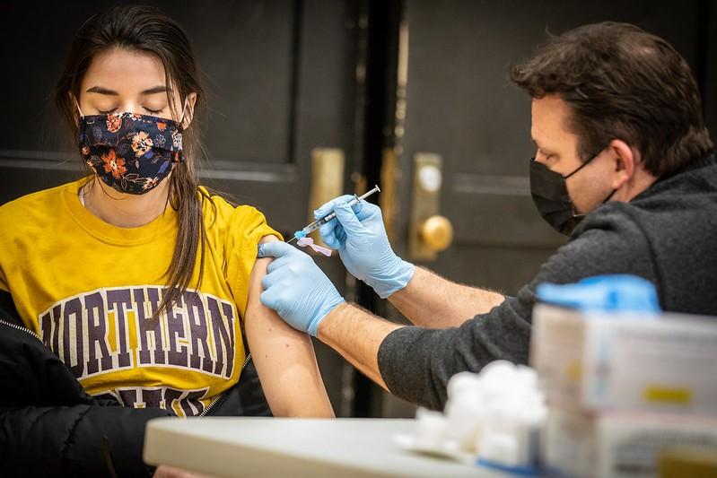 Teacher receiving the COVID-19 vaccine