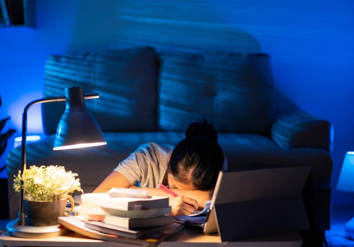 Student at laptop stressed out