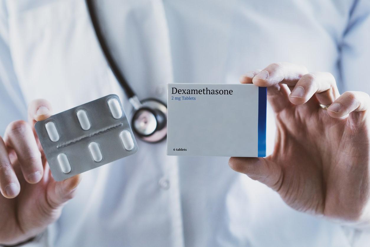 Doctor holding dexamethasone tablets