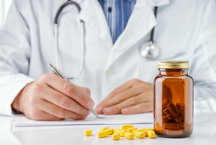 Doctor writing prescription