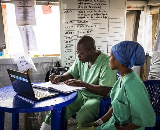 DR Congo Ebola health workers at laptop
