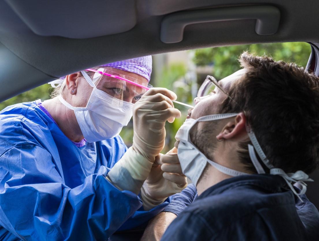Drive-through nasal swab testing