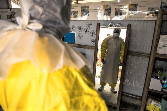 Ebola doctor's reflection in mirror
