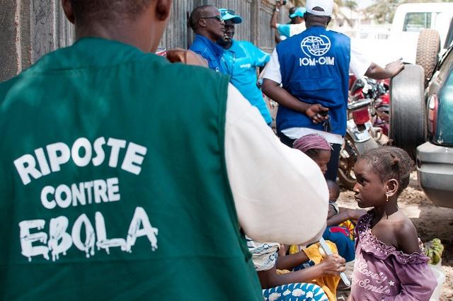 Boy with jacket "Riposte contre Ebola"