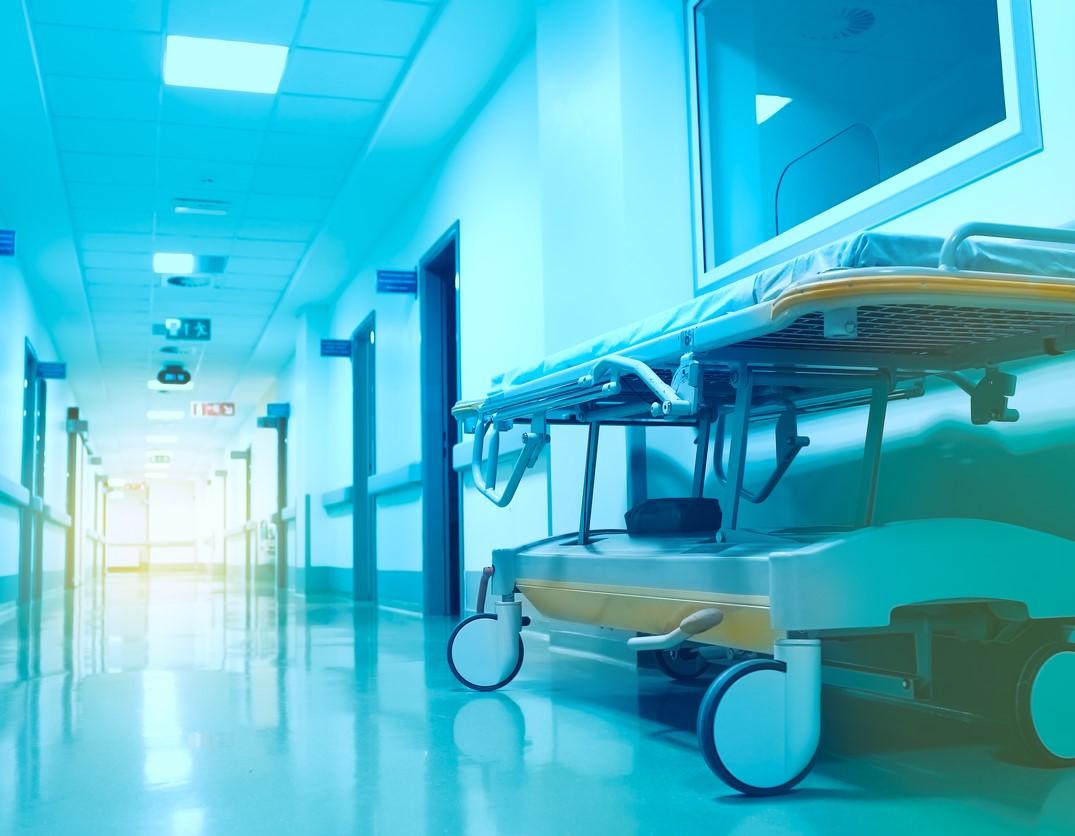 Empty gurney in hospital corridor