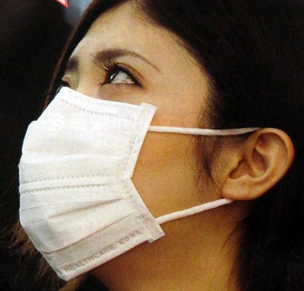 Woman wearing surgical mask