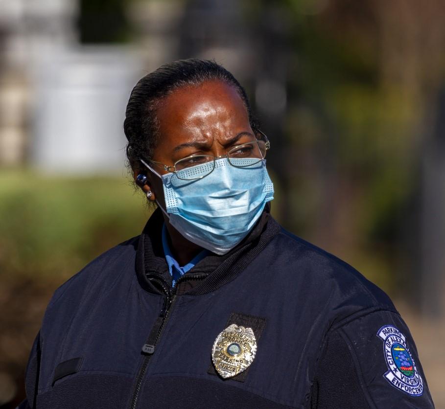 Female police officer wearing a mask