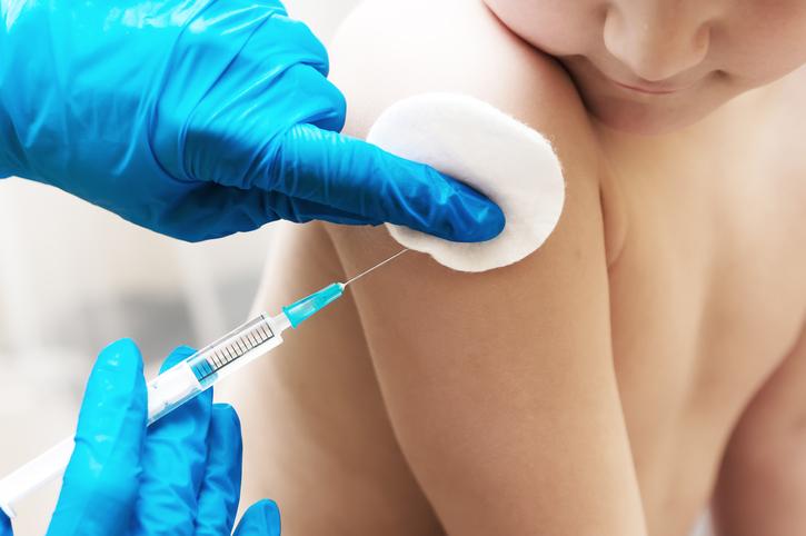 Boy getting flu shot