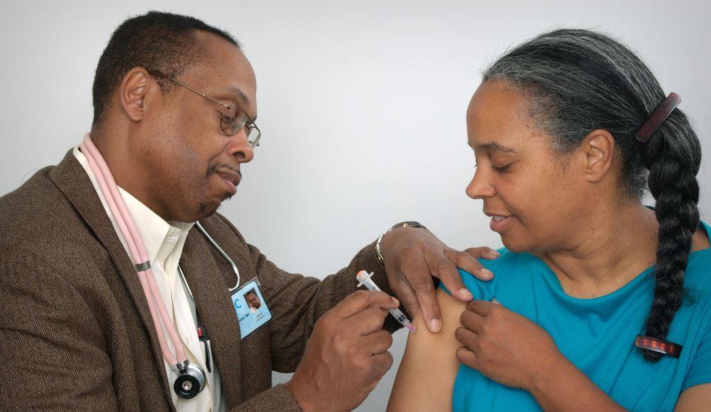 woman receiving vaccination