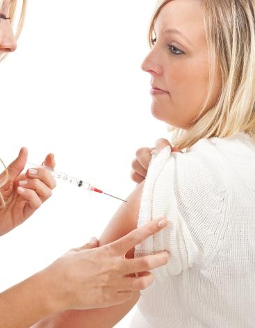 Woman receiving flu vaccine