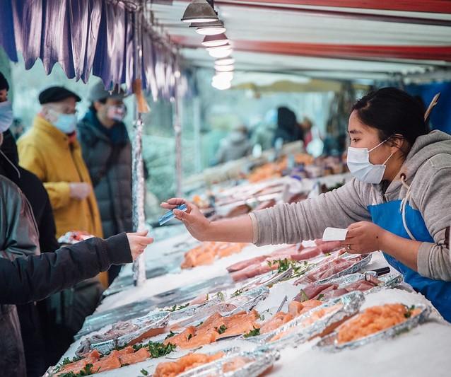 Fish market in France, mask wearing